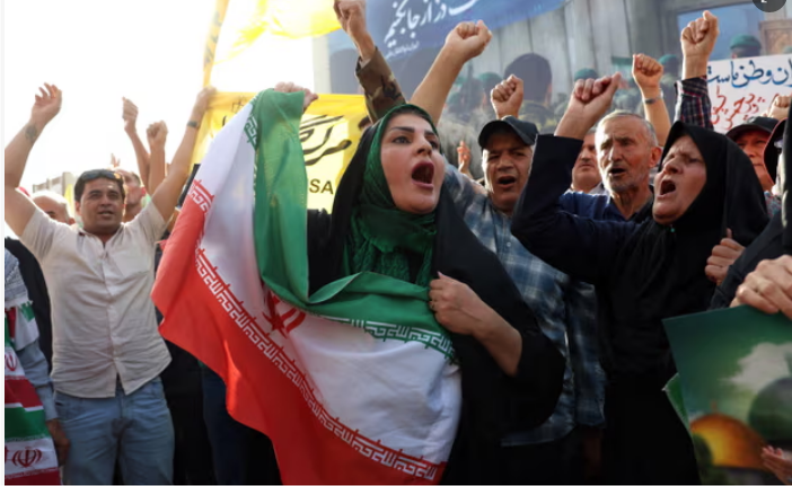 Iranians at an anti-US and anti-Israeli demonstration in Tehran. Donald Trump has floated the idea of regime change in Iran.